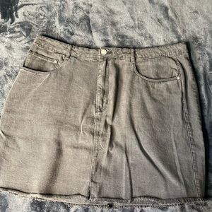 A size 24 skirt with slit at the bottom from Boohoo.